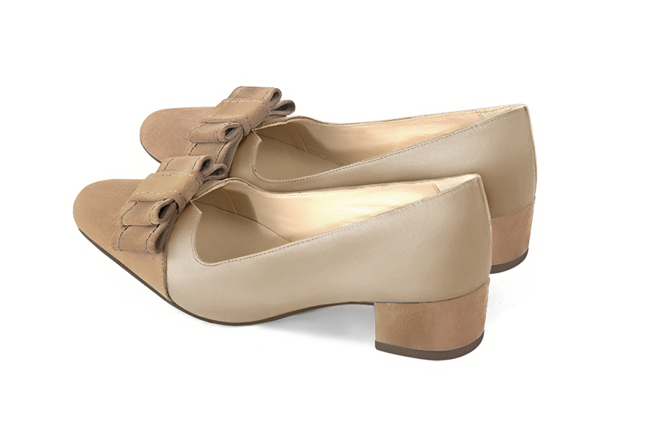 Tan beige women's dress pumps, with a knot on the front. Round toe. Low block heels. Rear view - Florence KOOIJMAN